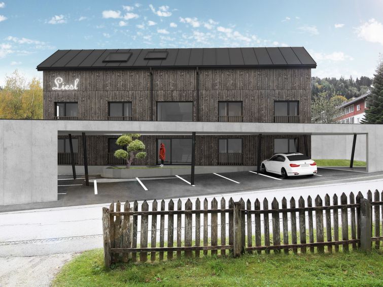 Bergzicht en luxe: ruim appartement met sauna in Haus in Haus