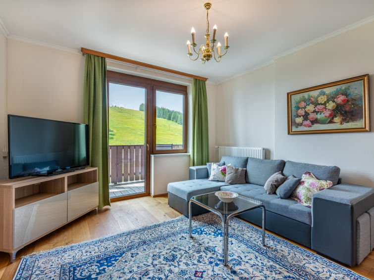 Aan de piste: Ruim appartement met bergzicht in Sankt Urban in Sankt Urban