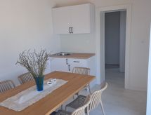 Open haard en verwarmd zwembad in Luxury Grey house, Domanovići - thumbnail 1