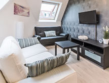 Op 600 m van zee: Zonnig duplex appartement in De Haan - thumbnail 1