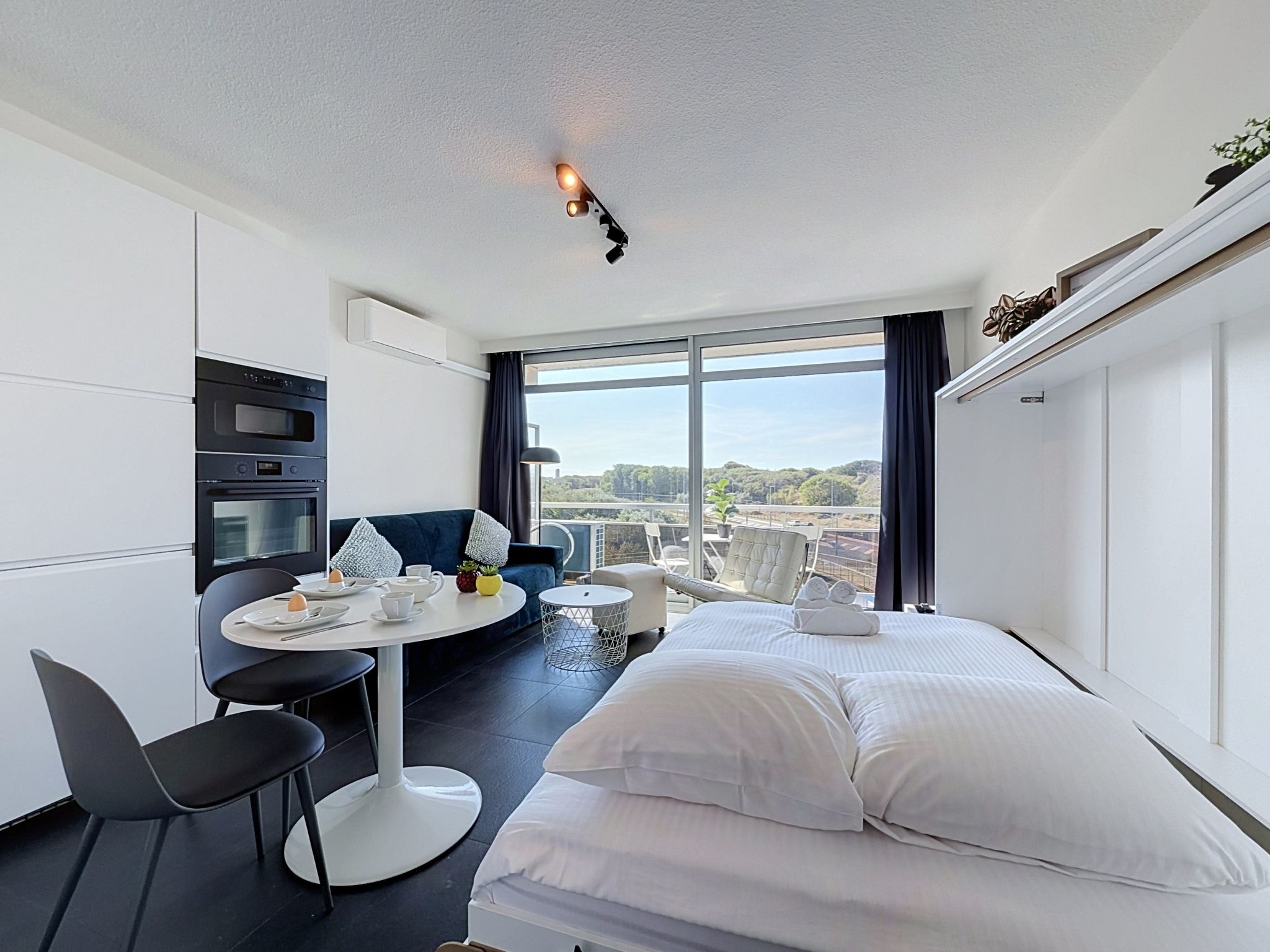 Astrid with parking and seaview - Binnen
