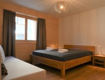 Ruim appartement met open haard en panoramisch uitzicht op de bergen - thumbnail 6