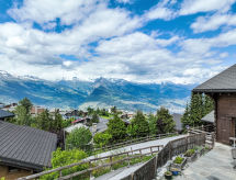 Chalet Petit Nid in Nendaz: open haard en bergzicht op 550m van de piste - thumbnail 6