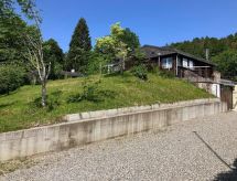 Vrijstaand chalet in Les Prés-d'Orvin met tuin, open haard en Jura-uitzicht - thumbnail 4