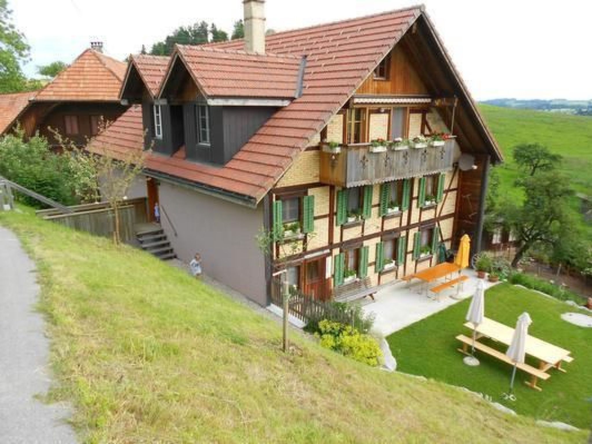 Holiday flat in the Bauern-Stöckli The house was originally a Spycher. The flat was built around it. So you go from the entrance to the kitchen, through the living room to the first bedroom, through ..