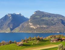 Panoramisch appartement met groot terras en uitzicht op het meer van Thun - thumbnail 1