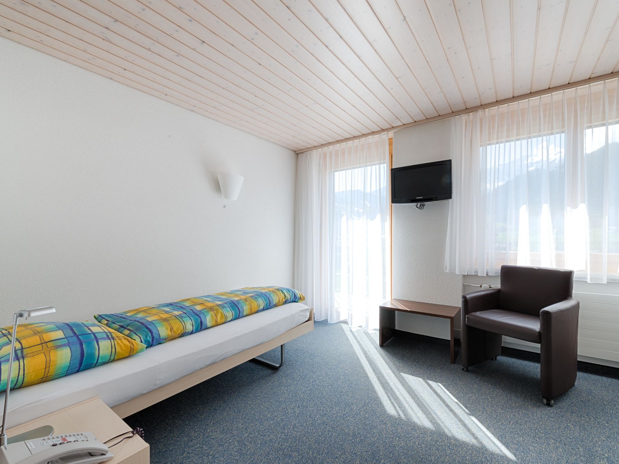 Ferien- und Familienhotel Alpina Doppelzimmer, Dusche, WC, Standard - Drinnen