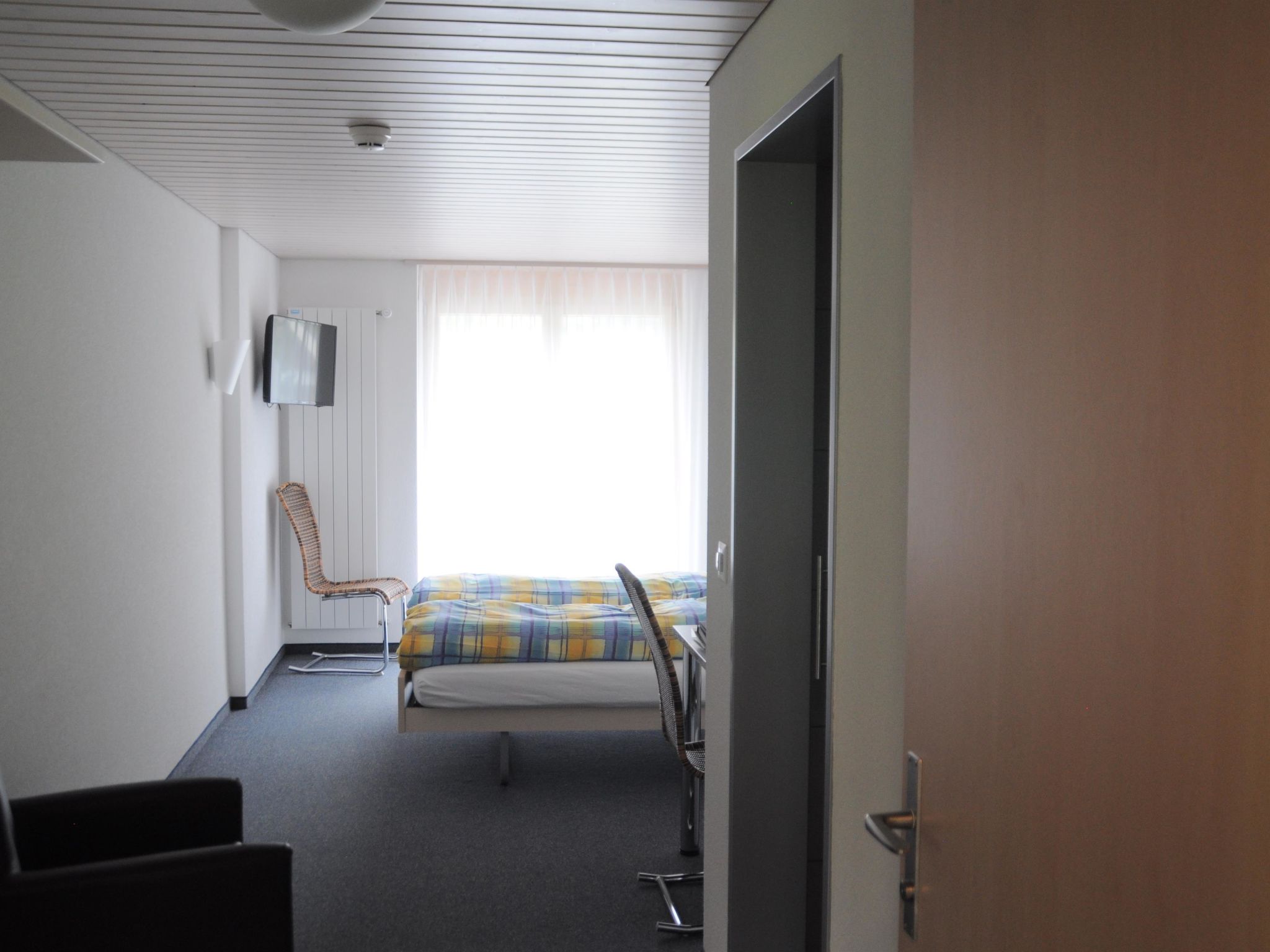 Ferien- und Familienhotel Alpina Doppelzimmer, Dusche, WC, Standard - Drinnen