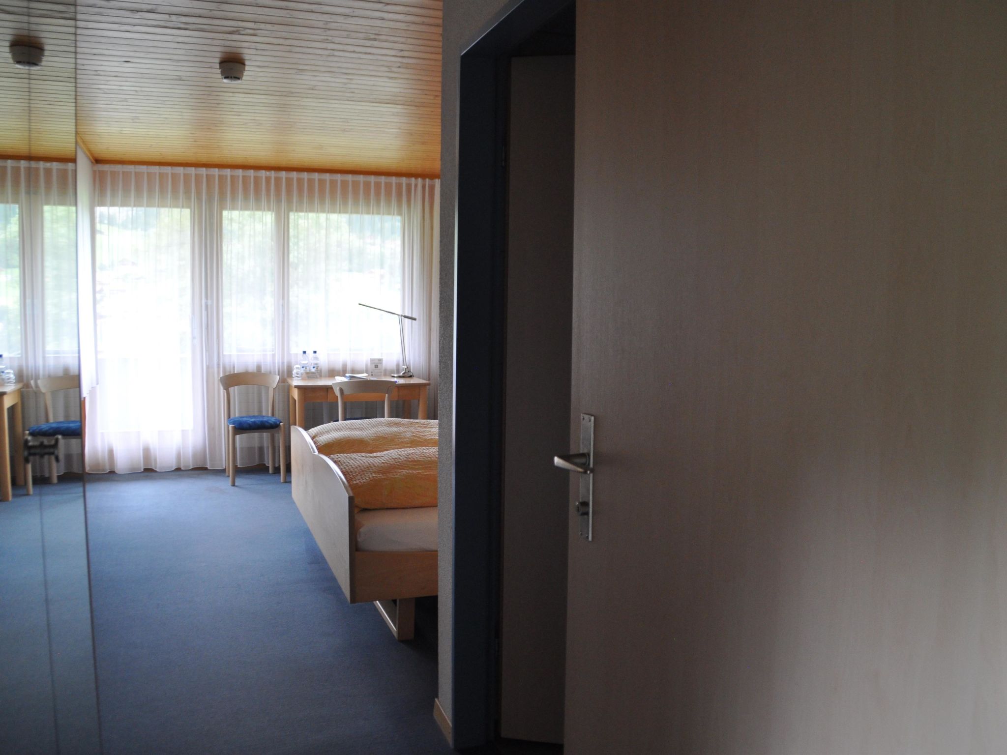 Ferien- und Familienhotel Alpina Doppelzimmer, Dusche, WC, Standard - Drinnen