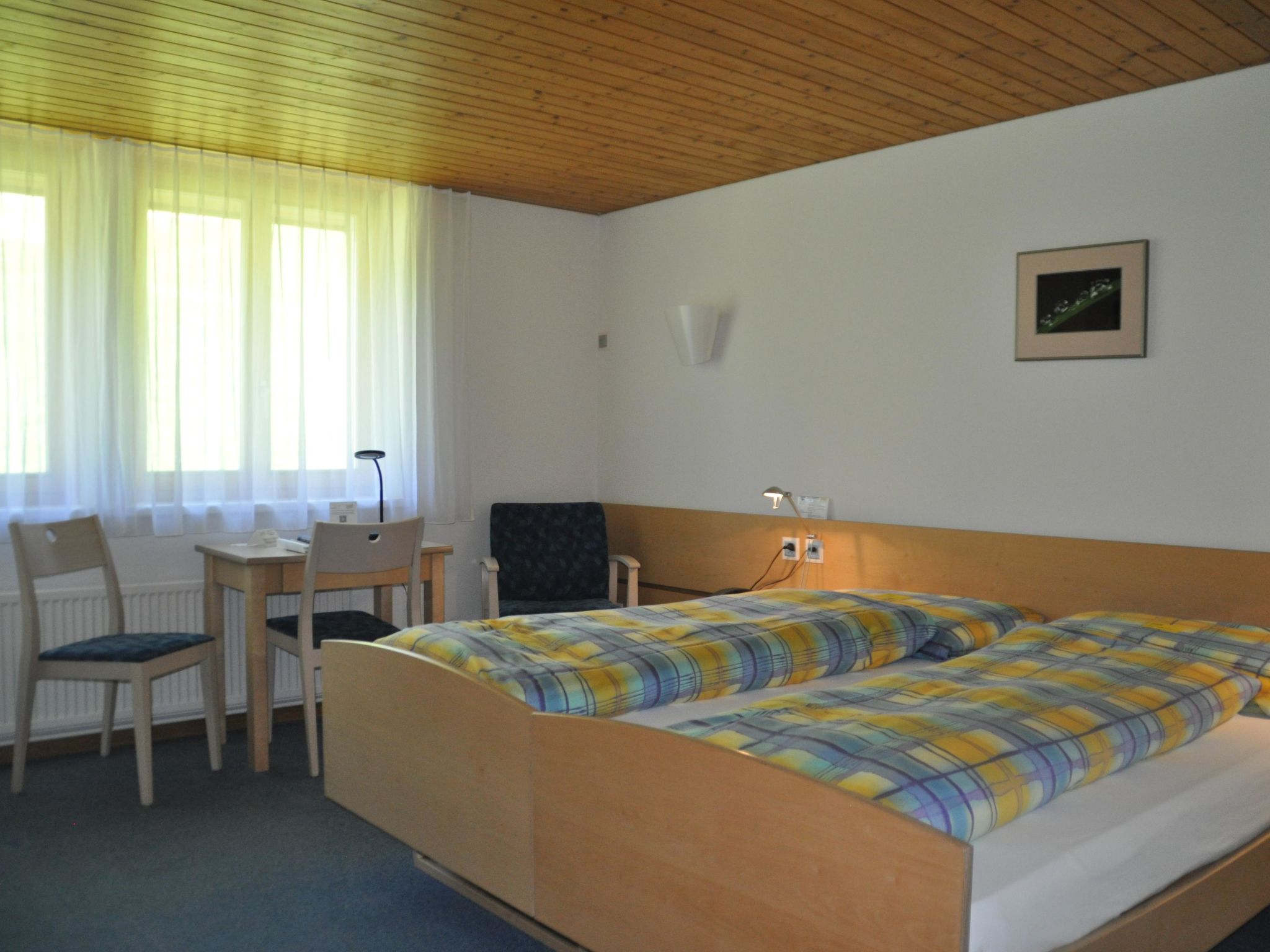 Ferien- und Familienhotel Alpina Doppelzimmer, Dusche, WC, Standard - Drinnen