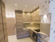Haus Flaminia 39: Gezellig appartement in hartje Leukerbad met open haard - thumbnail 4