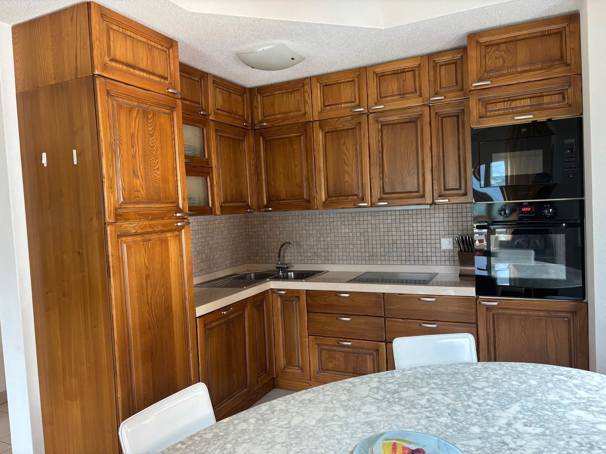 Photo of Ambassador Leukerbad # 4-bed apartment, Dusche und Bad, WC