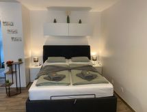 Compact studio-appartement voor 4 personen direct aan de skipiste in Leukerbad - thumbnail 2