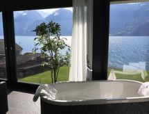 Exclusieve villa direct aan het Vierwoudstedenmeer met panoramisch uitzicht - thumbnail 1