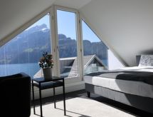 Villa am See 2: Luxe vakantievilla met privéstrand aan het Vierwoudstrekenmeer - thumbnail 6