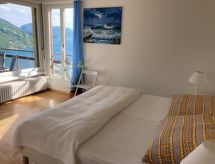 Licht appartement met panoramisch uitzicht over het Meer van Lugano - thumbnail 4