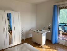 Licht appartement met panoramisch uitzicht over het Meer van Lugano - thumbnail 6