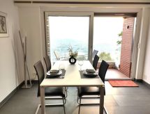 Panoramisch appartement op Monte Brè met uitzicht over de baai van Lugano - thumbnail 1