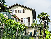 Zonnig vakantiehuis al Ronchetto nabij Lugano met uitzicht op wijngaarden - thumbnail 1