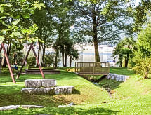 Ferienwohnung Residenza Parcolago Apt 018 mit Garten