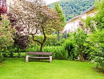 Ferienwohnung Residenza Parcolago Apt 018 mit Garten