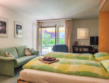 Ferienwohnung Residenza Parcolago Apt 018 mit Garten