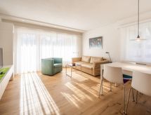 Appartement 50m² direct aan skipiste in Laax met uitzicht op bergen en meer - thumbnail 1