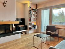 Compact studio-appartement direct aan de skipiste in Laax - thumbnail 1