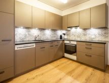 Riant appartement in Laax, direct aan de skipiste met uitzicht op berg en meer - thumbnail 6