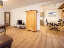 Riant appartement in Laax, direct aan de skipiste met uitzicht op berg en meer - thumbnail 4