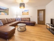Riant appartement in Laax, direct aan de skipiste met uitzicht op berg en meer - thumbnail 3