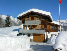 Knus appartement voor 6 aan de skipiste in Obersaxen met balkon - thumbnail 1