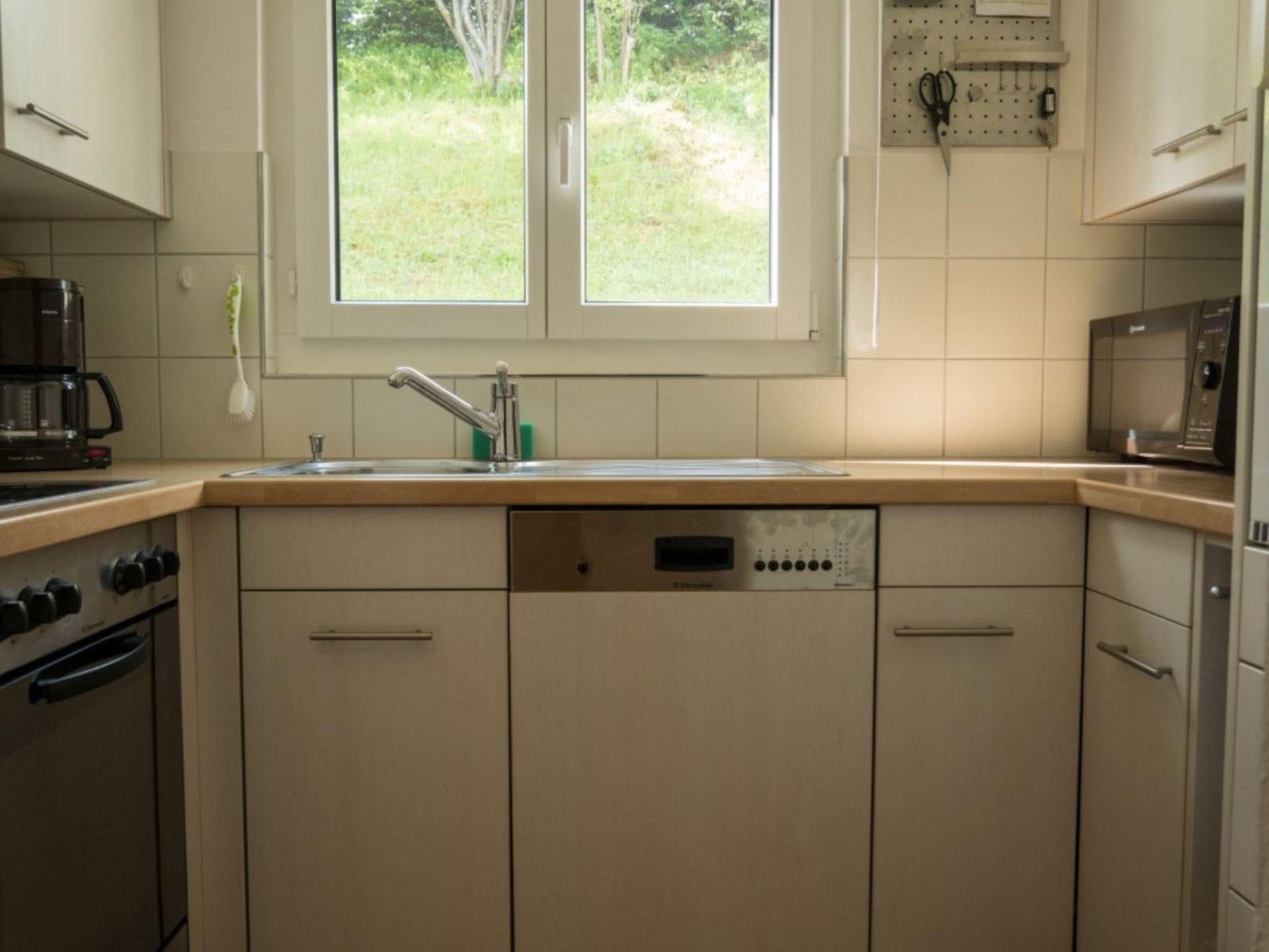 Appartement Casa Sogn Giacun Guyet Brigels, (Breil/Brigels), 65035B – Cuisine et coin repas, photo 14 sur 28