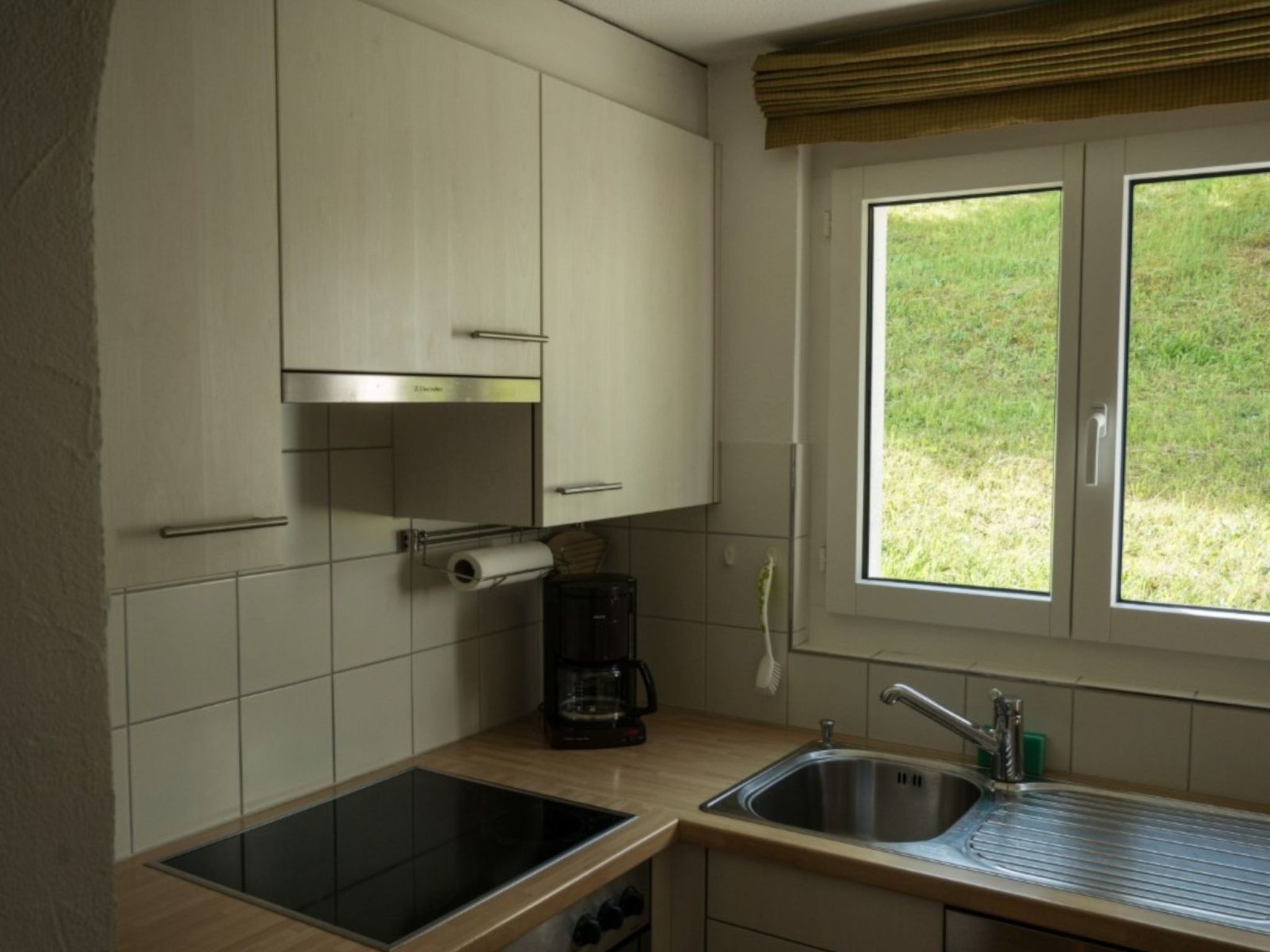 Appartement Casa Sogn Giacun Guyet Brigels, (Breil/Brigels), 65035B – Cuisine et coin repas, photo 13 sur 28