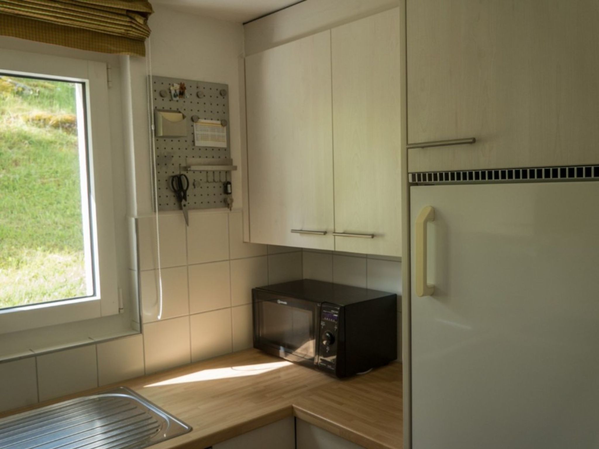 Appartement Casa Sogn Giacun Guyet Brigels, (Breil/Brigels), 65035B – Cuisine et coin repas, photo 12 sur 28