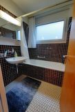 Gemütlichkeit: Gezellig appartement met zwembad, sauna en bergzicht in Brigels - thumbnail 5