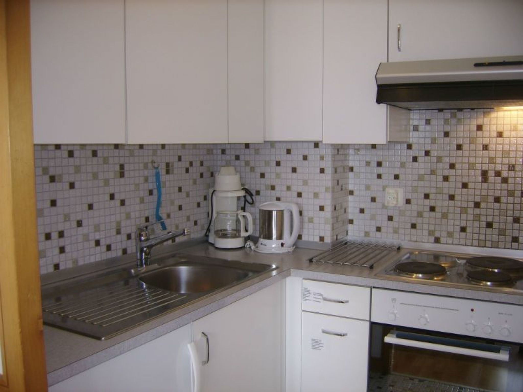 Appartement Gabriela 23 Defuns Brigels, (Breil/Brigels), 65034B – Cuisine et coin repas, photo 18 sur 19