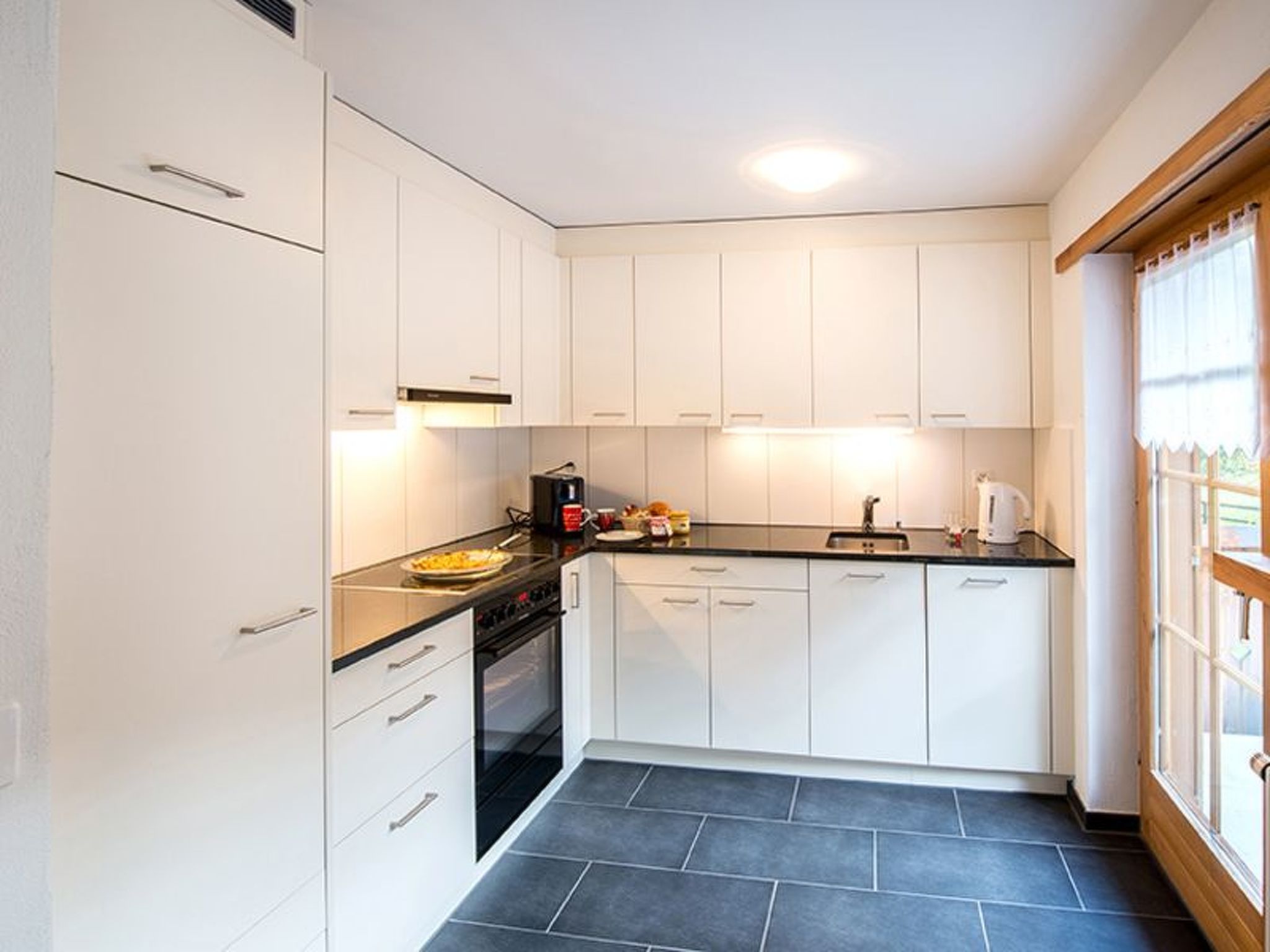 Appartement Ferienhaus Muntschi, (Andeer), – Cuisine et coin repas, photo 11 sur 38