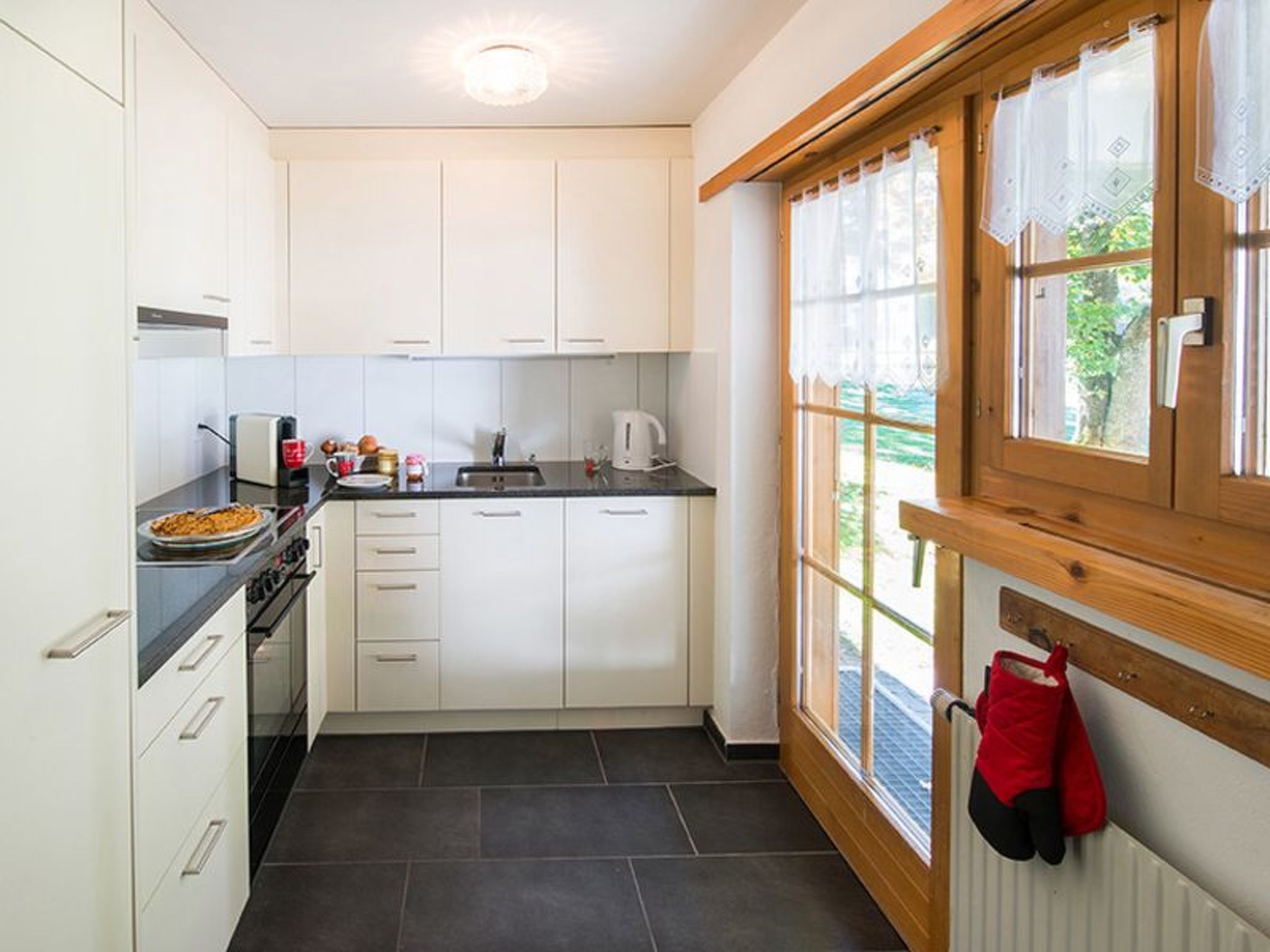 Appartement Ferienhaus Muntschi, (Andeer), – Cuisine et coin repas, photo 9 sur 39