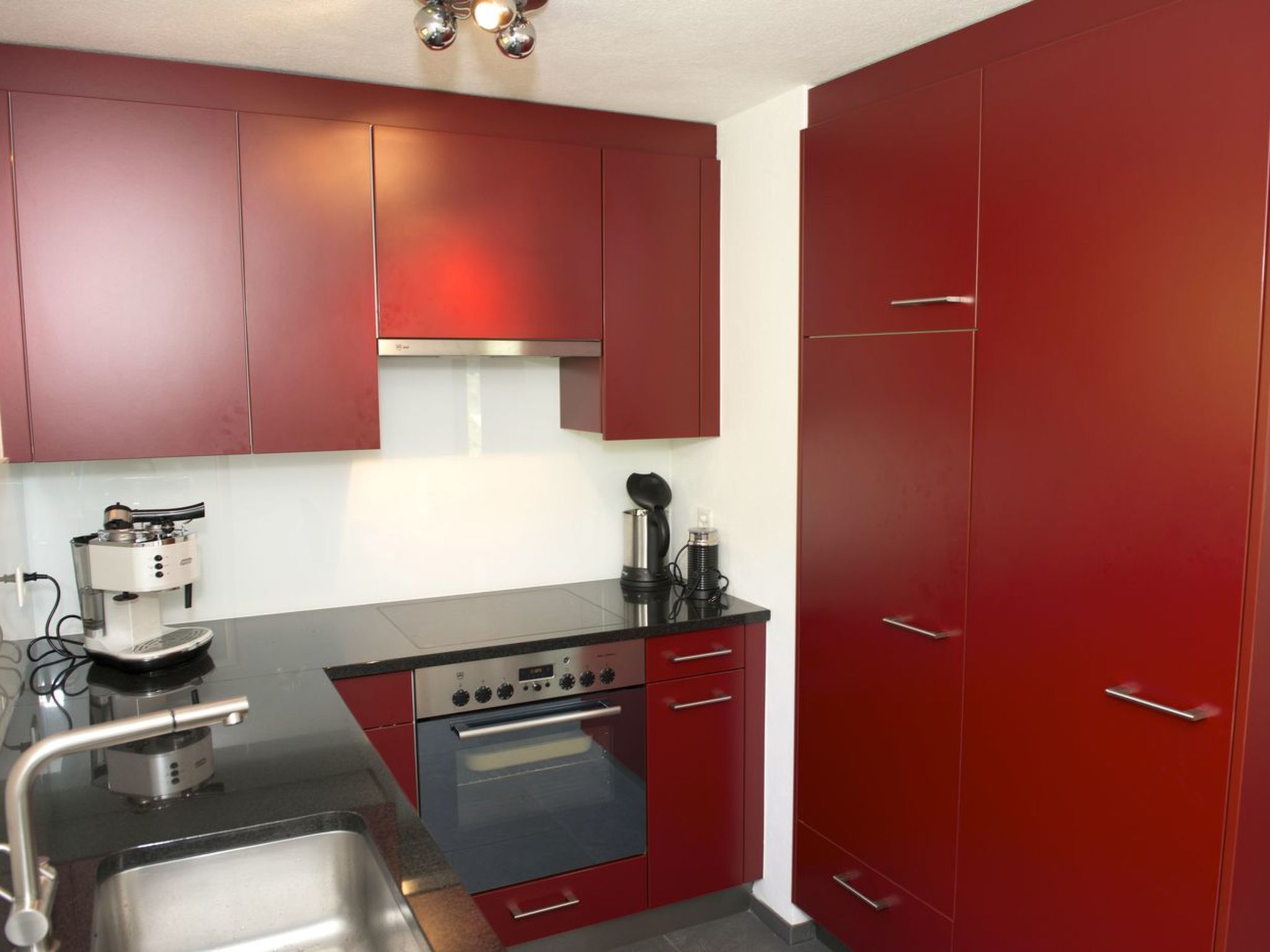 Appartement Chasa Tablà, (Guarda) – Cuisine et coin repas, photo 9 sur 22