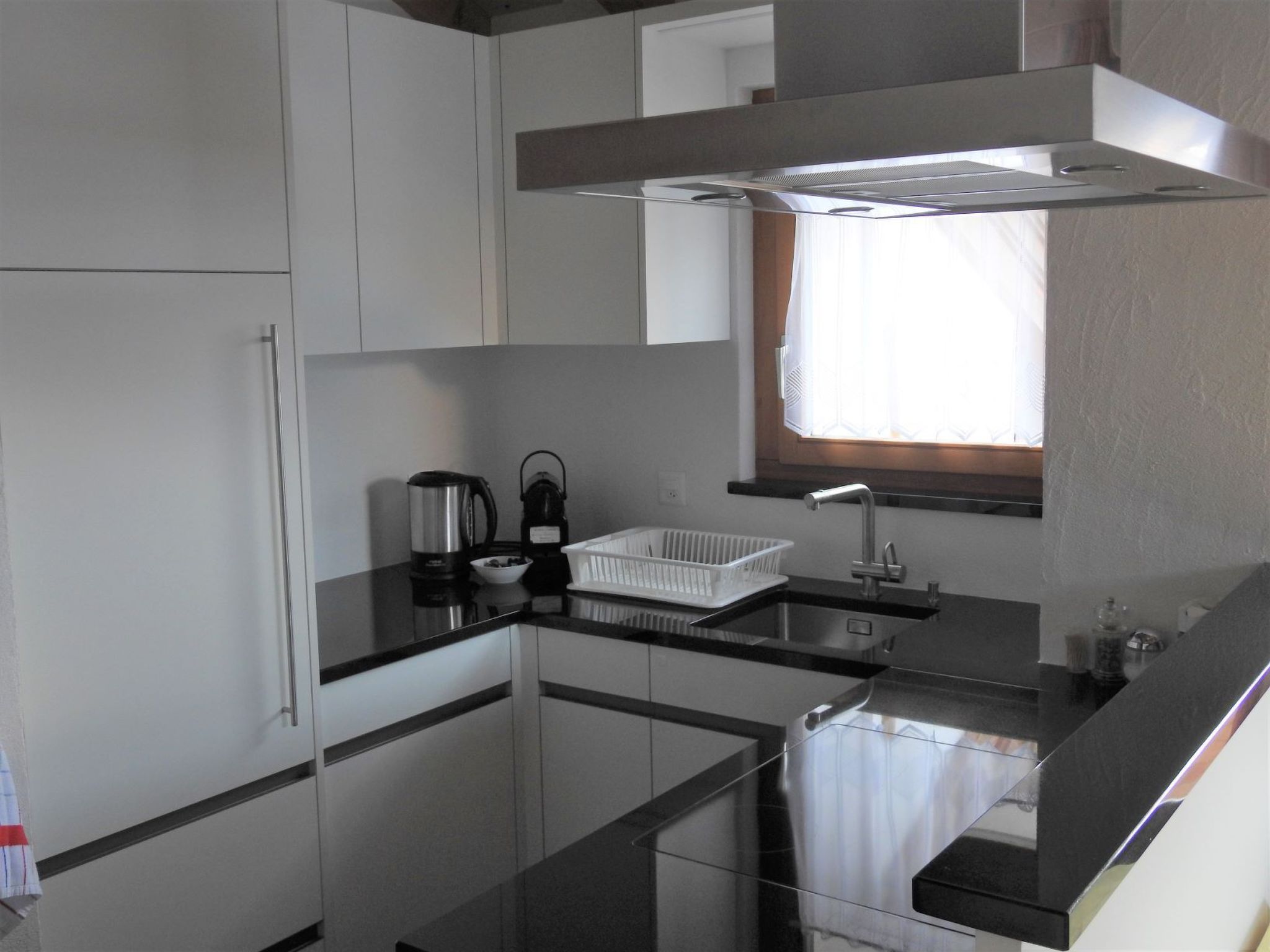 Appartement Via da Pedra Grossa 427A, (Scuol) – Cuisine et coin repas, photo 7 sur 22