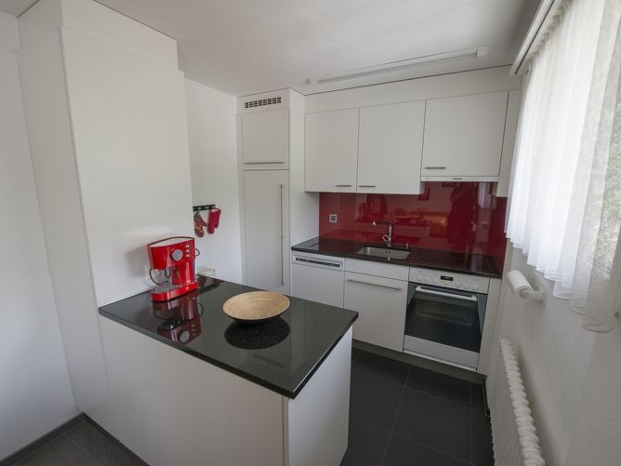 Appartement STEINMANN, (Scuol) – Cuisine et coin repas, photo 18 sur 23