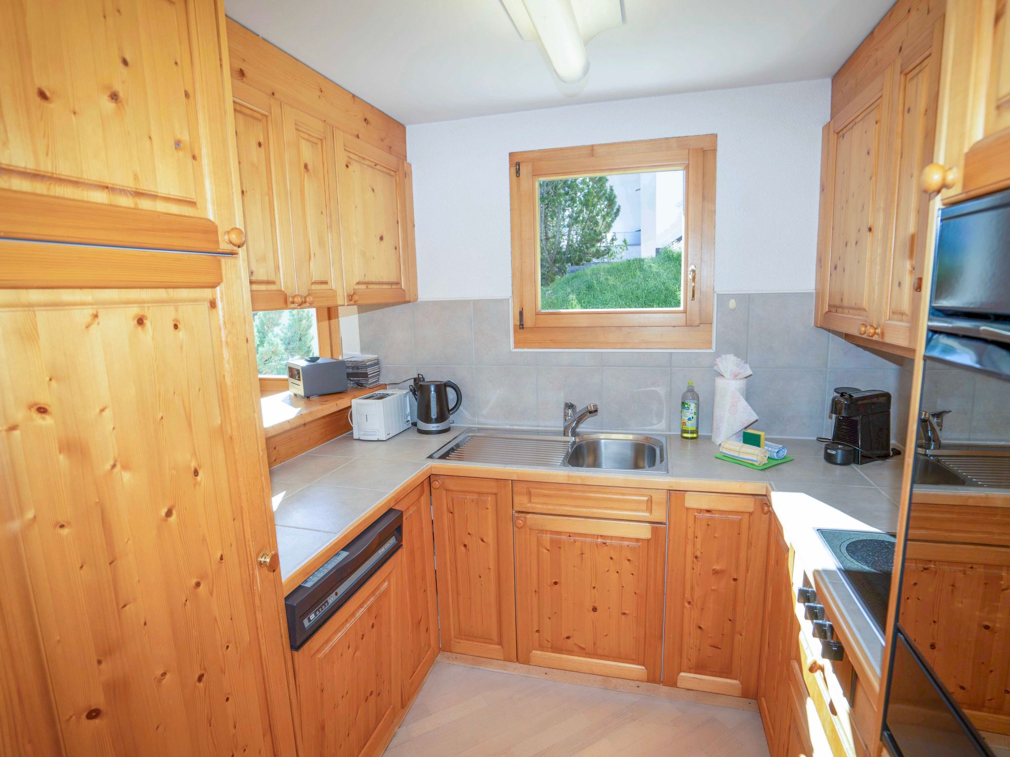 Appartement ENZ, (Scuol) – Cuisine et coin repas, photo 17 sur 25