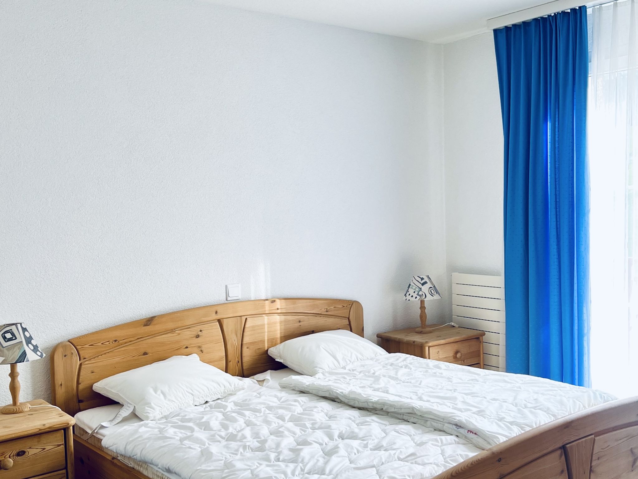 Haus Alpina (CharmingStay). 2.5-Zimmerwohnung mit zwei Balkonen - Drinnen