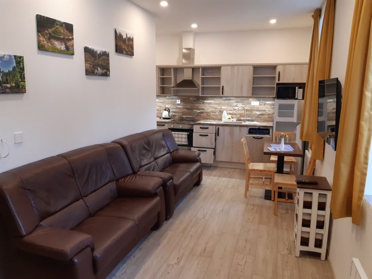 "Protržená přehrada Bílá Desná", 2-room apartment 36 m2. Modern furnishings: 1 room with 3 beds and 1 x 1 bunk beds. Living/dining room with 2 sofabeds, dining table and TV. Kitchen (oven, dishw..