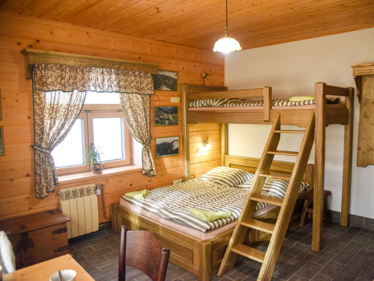 "Stará Huť", 4-room apartment 70 m2, on the ground floor. Renovated in 2017, wooden furniture furnishings: living/dining room with dining table, satellite TV and international TV channels. Living/sl..