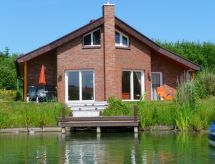 Luxe vakantiehuis Stella Maris met privé-steiger direct aan het meer - thumbnail 1