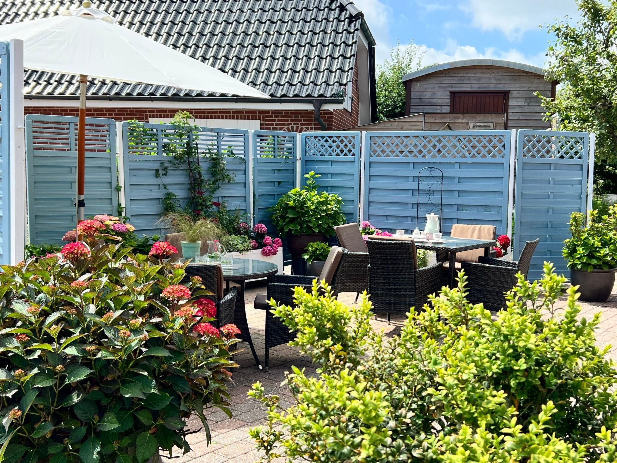 Gemütliche Wohnung für 2 Personen mit Gartensaun - Buiten