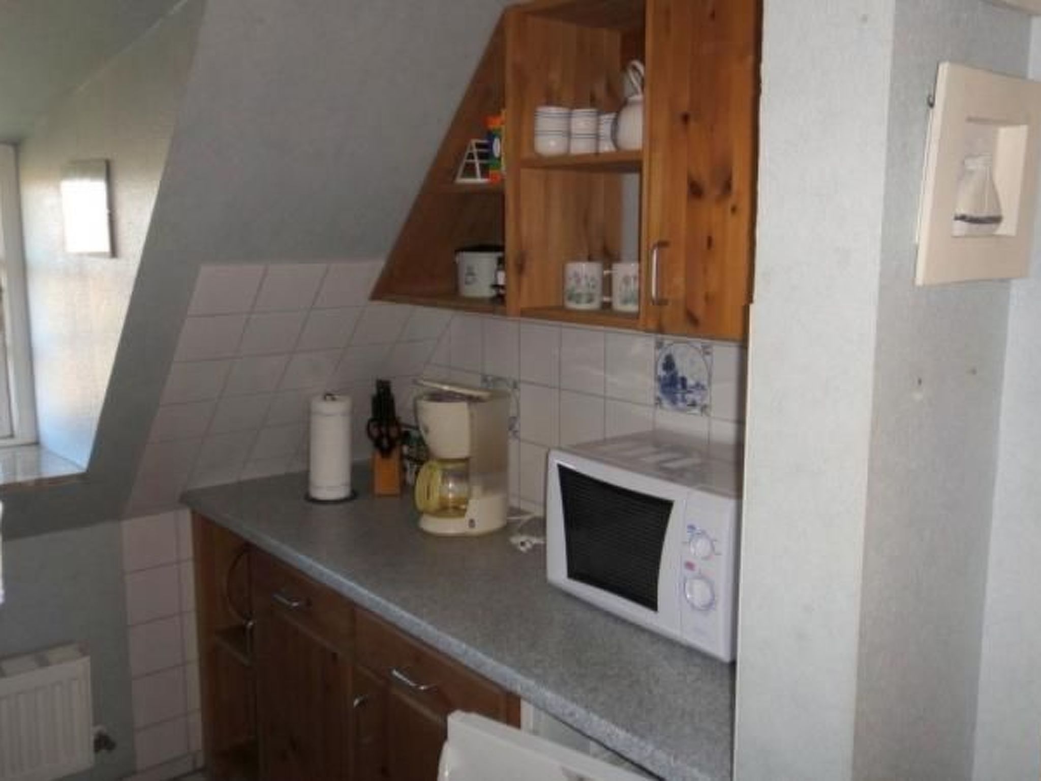 Historisch rietgedekt vakwerkhuis bij de Waddenzee in Dagebüll - foto 11