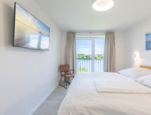 Zonovergoten vakantieflat aan het meer in Nordstrand, vlakbij de Noordzee - thumbnail 4
